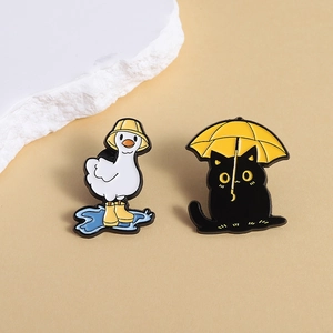 Cute black cat with umbrella and yellow duck enamel pin set for clothing or bags