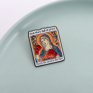 Cartoon enamel pin featuring Mary wearing boxing gloves with creative slogan on green plate
