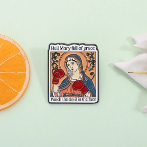 Tarot style Hail Mary boxing glove enamel pin badge with creative religious pop art design