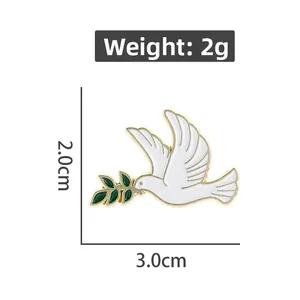 Détail du pin's colombe de la paix avec branche d'olivier, dimensions 2,0x3,0 cm incluses