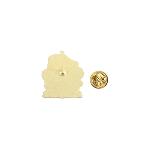 Detail of the golden metal badge back with matte finish and butterfly clutch pin closure