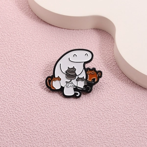 Detailed close-up of a cartoon enamel pin featuring a Flork character holding four cats