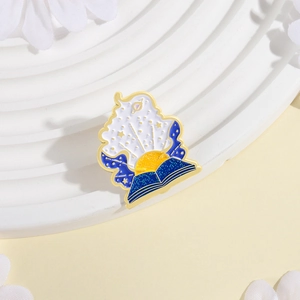 Starry night magic book enamel brooch with cosmic planet and star glitter details
