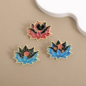 Three-piece starry lotus enamel pin set with sun and moon motifs on a gold alloy base