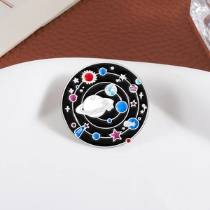 Creative astronaut galaxy enamel brooch with planet and star patterns on black metal