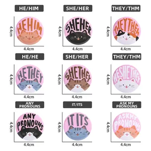 Detailed grid showing nine 4.4cm cat pronoun badges with size and weight specifications