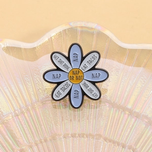 Creative daisy enamel pin with NAP slogan in a decorative shell tray, stylish floral badge