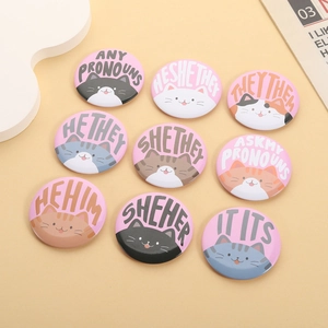 Set of 9 cute cartoon cat tinplate badges featuring various English pronouns for bags and clothes