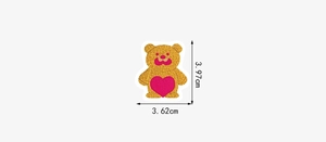 Detailed size view of gold sequin bear patch with pink heart embroidery decoration