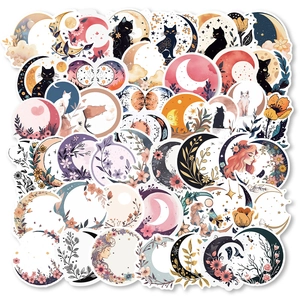 Detailed view of mystical moon and black cat stickers for scrapbook and phone case DIY