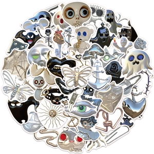 Close-up of 50pcs 3D skull stickers with metallic finish for laptops and helmets