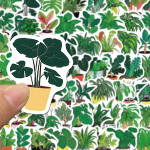 Close-up of waterproof PVC Monstera plant sticker with various green potted plant decals