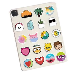 Detail of 20 unique VSCO stickers applied to a white laptop showing various colorful designs