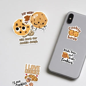 Detail showing cute cartoon cookie stickers applied on a smartphone back cover