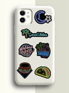 Close-up of cool neon stickers on a white phone case featuring retro burger and flamingo