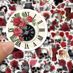 Close-up of gothic punk rose skull stickers with matte finish and vintage clock patterns