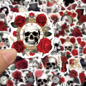 Detail of gothic punk skull and red roses sticker with clock design for skateboards