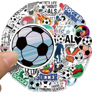 Macro shot of waterproof laser football stickers with vibrant soccer themes and goal slogans