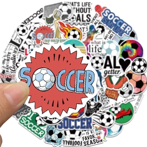 Close-up of waterproof football stickers featuring trophies, soccer balls and goal slogans