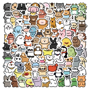 Close-up of assorted cute animal stickers with white borders for DIY scrapbooking decor