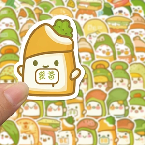 Close-up of a cute cartoon food sticker held by hand featuring a taco character