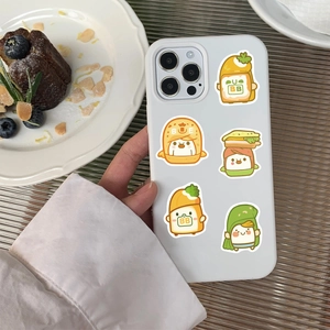 Matte silicone phone case with cartoon food stickers in a cozy afternoon tea setting
