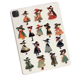 Set of 15 cute chibi witch stickers arranged on the back of a tablet for decoration