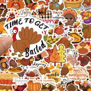Close-up of Thanksgiving turkey and maple leaf stickers with festive autumn patterns