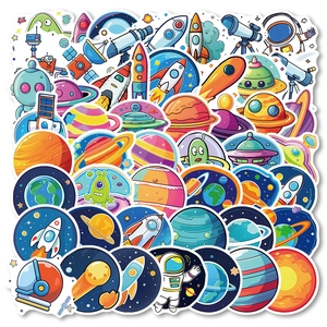 Flat lay showing waterproof PVC space stickers with rockets and cartoon astronauts