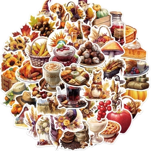 Detailed close-up of colorful Thanksgiving stickers featuring turkeys and autumn maple leaves