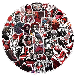 Macro detail of assorted gothic horror stickers featuring skulls demons and dark red roses