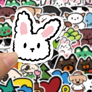 Handheld shot of cute cartoon rabbit sticker from Korean style animal party set