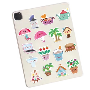 50pcs cute cartoon waterproof PVC stickers with smiley faces on a white tablet