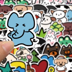 Detail showing a cute blue cartoon elephant sticker for journaling and laptop decoration