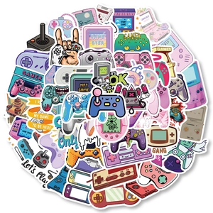 Detailed pile of vintage gaming stickers featuring retro controllers and handheld consoles