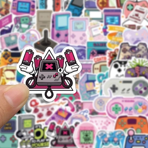 Close-up of retro game boy sticker with pink batteries on waterproof vinyl material