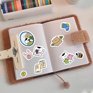 DIY cartoon bear and cat stickers arranged in a cozy plush notebook with stationery