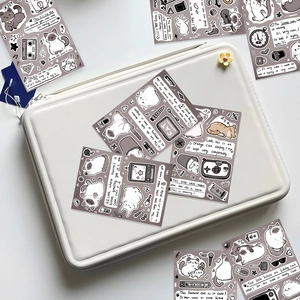 Cute Siamese cat stickers and bunny decals on a white quilted tablet sleeve for journaling
