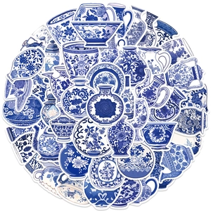 Close-up of assorted blue and white Chinese porcelain stickers with traditional patterns