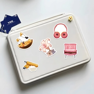 50 creative waterproof stickers featuring food and music art on a laptop sleeve