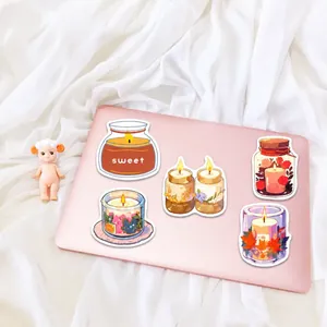 Waterproof hand-drawn scented candle stickers set on pink laptop lid decoration