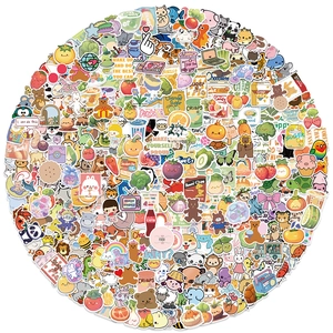 Variety pack of cartoon animal and food stickers arranged in a creative circular layout