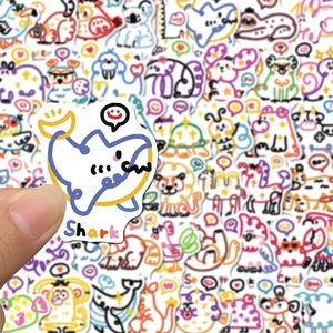 Detail shot showing a cute shark cartoon sticker from a 50-piece animal doodle collection
