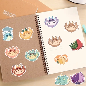 Cute cartoon owl stickers featuring various expressions on a notebook for decoration
