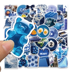 Detail showing translucent blue jelly bear and various DIY waterproof stickers