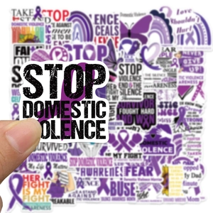 Hand holding Stop Domestic Violence purple ribbon PVC stickers for luggage and laptop