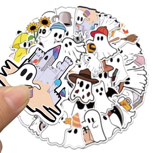 Close-up of cute ghost stickers for scrapbooking showing size and waterproof material