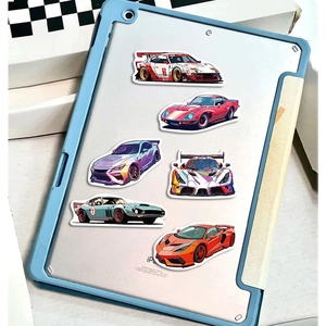Close-up of waterproof racing car stickers applied on a blue tablet protective case