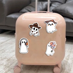 50pcs cute ghost stickers on a pink suitcase, waterproof cartoon decals for luggage decoration