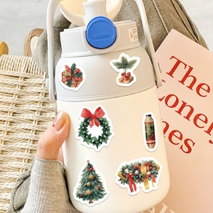 Cartoon nutcracker Christmas collage stickers decorating a white water bottle